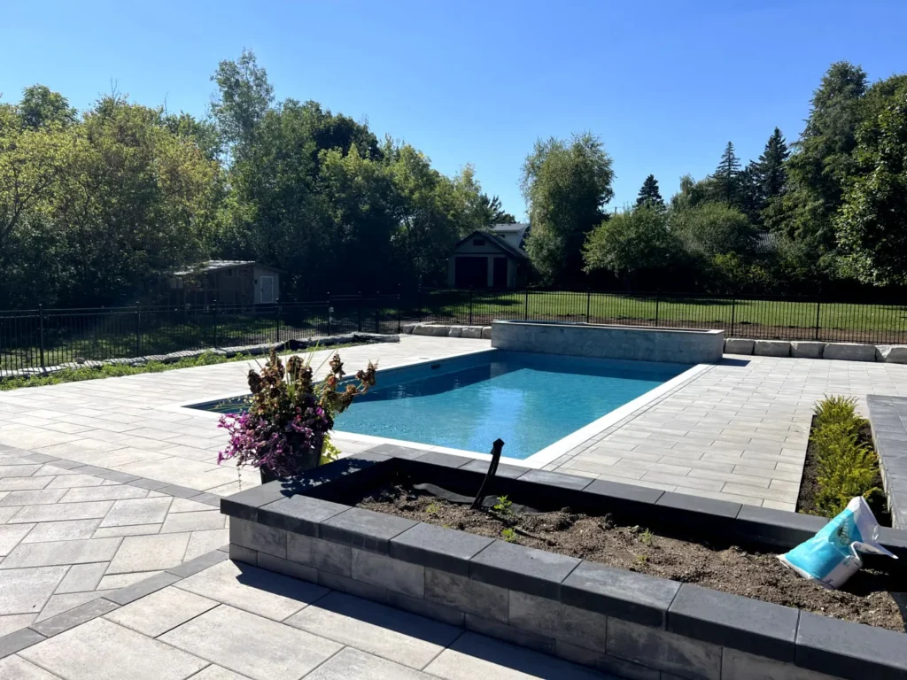 Backyard Pool and Landscape Interlock Installation by Destination Pools & Landscaping in Toronto and South Mississauga