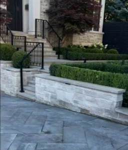 Residential retaining walls in frontyard of property in Toronto, built by Destination Pools & Landscaping
